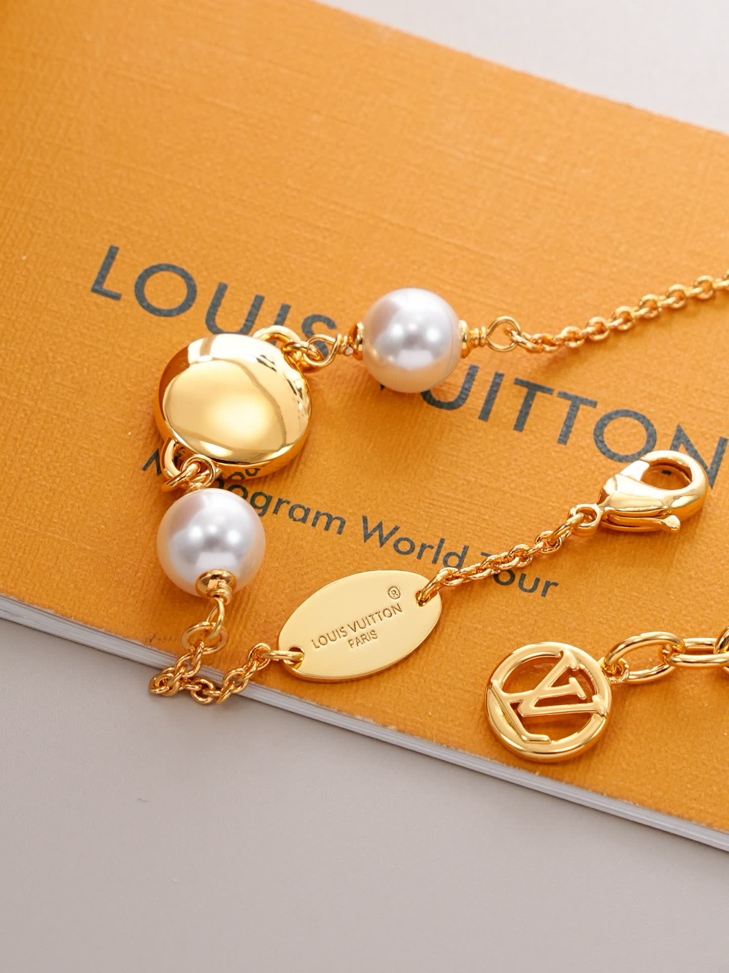 Louis Vuitton Pink Enamel Logo Bracelet with Pearls